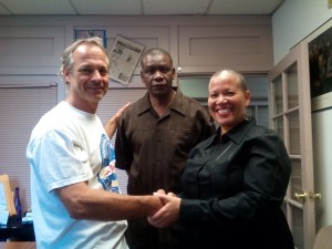 Brian (left), land lord of the office suites, welcomes in Renea Wickman (right) into the office building on behalf of Danny Tillman. Reginald Young (center) is a stronger supporter of Tillman and is helping to move the campaign forward. 