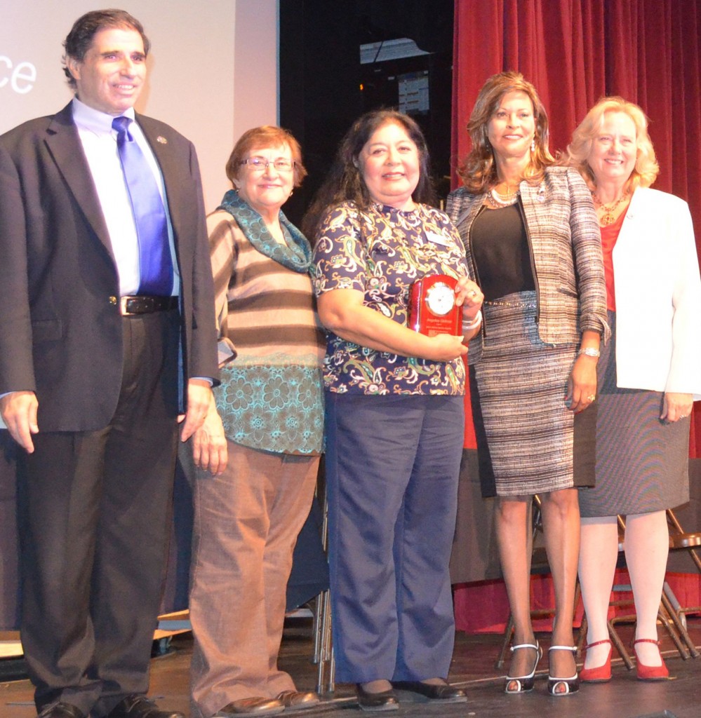 Shown left to right are Chancellor Bruce Baron, President of the SBCCD Board of Trustees Donna Ferracone, 45 year employee of SBVC, Angelita Gideon, Dr. Gloria Fisher, interim president of SBVC and Dr. Cheryl Marshall, president of Crafton Hills College.