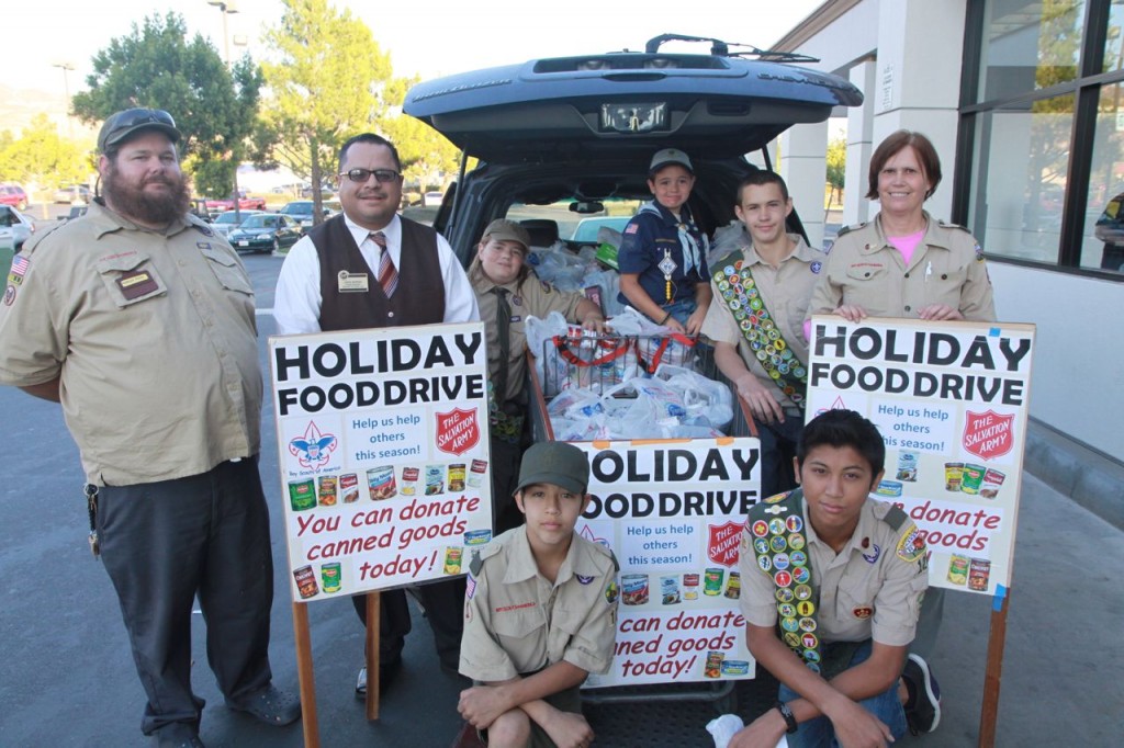 Back row left to right Scout Leader Charles Price, Stater Bros. Manager Jorge Moreno, Stone Price, Austin Price, Lucus Compagna, and Scout Leader Anne Compagna. Front left William Anderson, and front right Jason Bun.