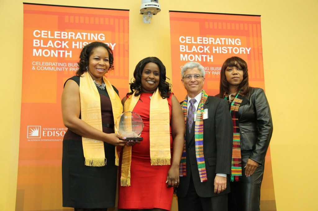 Tremaine Mitchell (second from left), director of Operations for the Youth Action Project, receives the Community Partnership Award from Southern California Edison (SCE) during SCE’s recent Black History Month celebration.  SCE President Pedro Pizarro (second from right), Tammy Tumbling, director of Philanthropy and Community Involvement (right) and Qiana Charles (left), local public affairs manager, presented the award to the organization for successfully helping youth and young adults in the development of skills and habits needed to experience economic and social success. Since 2007, it has hired and trained more than 200 local college students, provided more than 90,000 work experience and community service hours and provided tutoring and mentoring to more than 1,000 high school students within the San Bernardino Unified School District.  