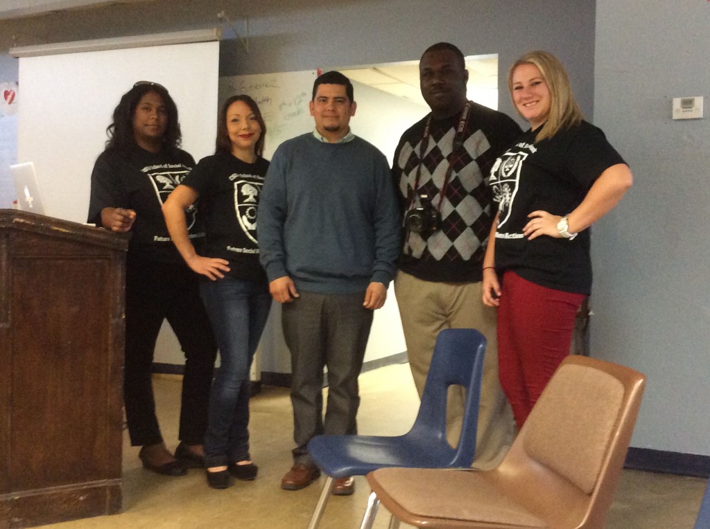 Social Work Policy group with Pal Charter guidance counselor Daniel Ibarra in middle