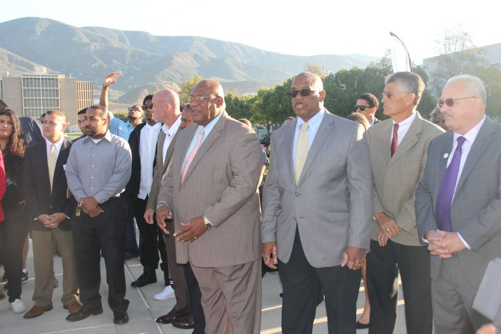 Tomas Morales, President, California State University, San Bernardino, (center), & several community members who joined the 'MOB'  to greet & encourage the invited students, & to connect them to an academic future with CSUSB, & beyond.