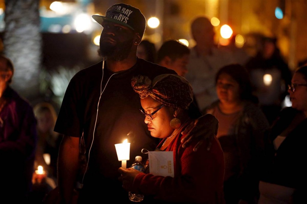 Community residents gather in San Bernardino during a previous candle light vigil for the victims of last Wednesday’s attack. (Photo courtesy of NBC News). 