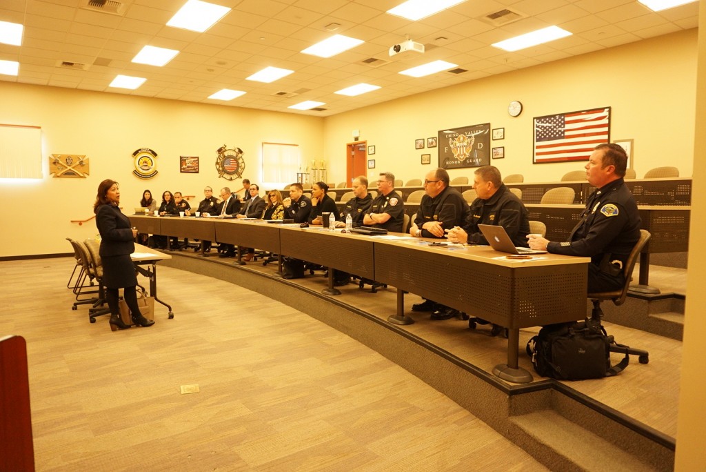 U.S. Representative Norma J. Torres speaks with fire and police chiefs in Chino.